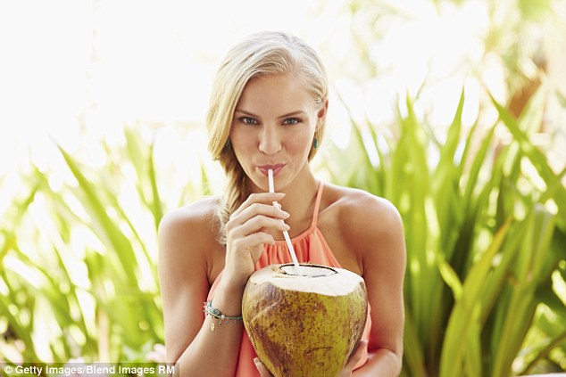 1407795752024_wps_1_caucasian_woman_drinking_